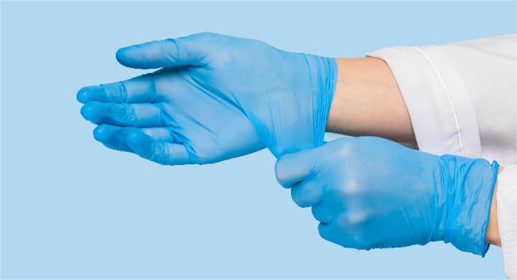 In industrial environments, nitrile gloves serve as a frontline defense against chemical hazards.